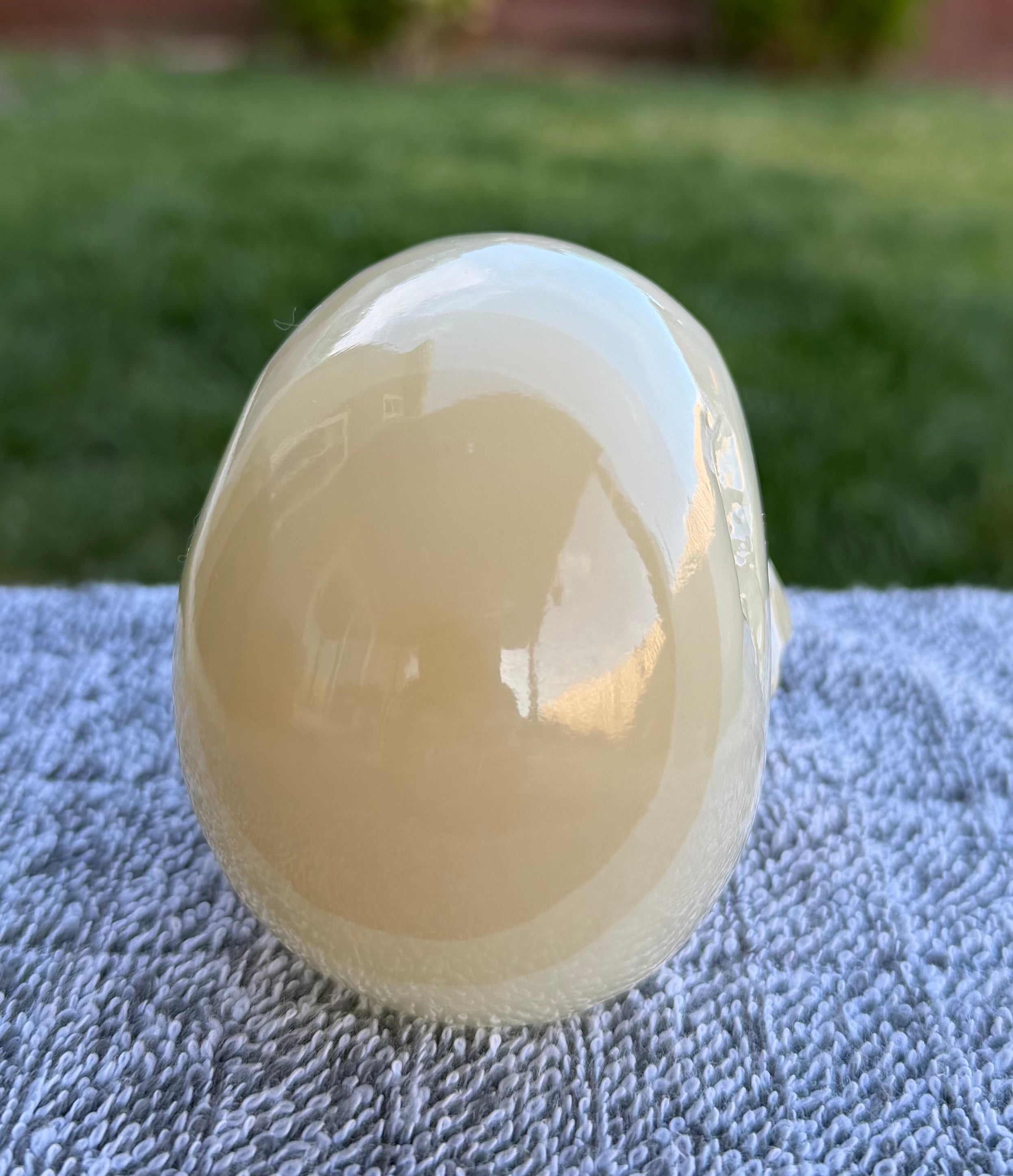 Mexican Green Onyx Skull Carving - UV Reactive Banded Calcite