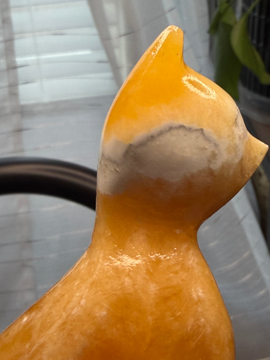 Orange Calcite Cat Carving - UV Reactive Fluorescent Stone Figurine