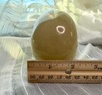 Mexican Green Onyx Skull Carving - UV Reactive Banded Calcite