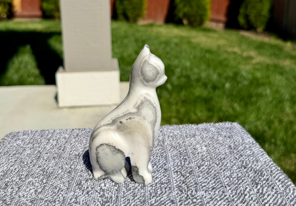 Zebra Calcite Sitting Cat Carving from Mexico - UV Reactive Stone Figurine