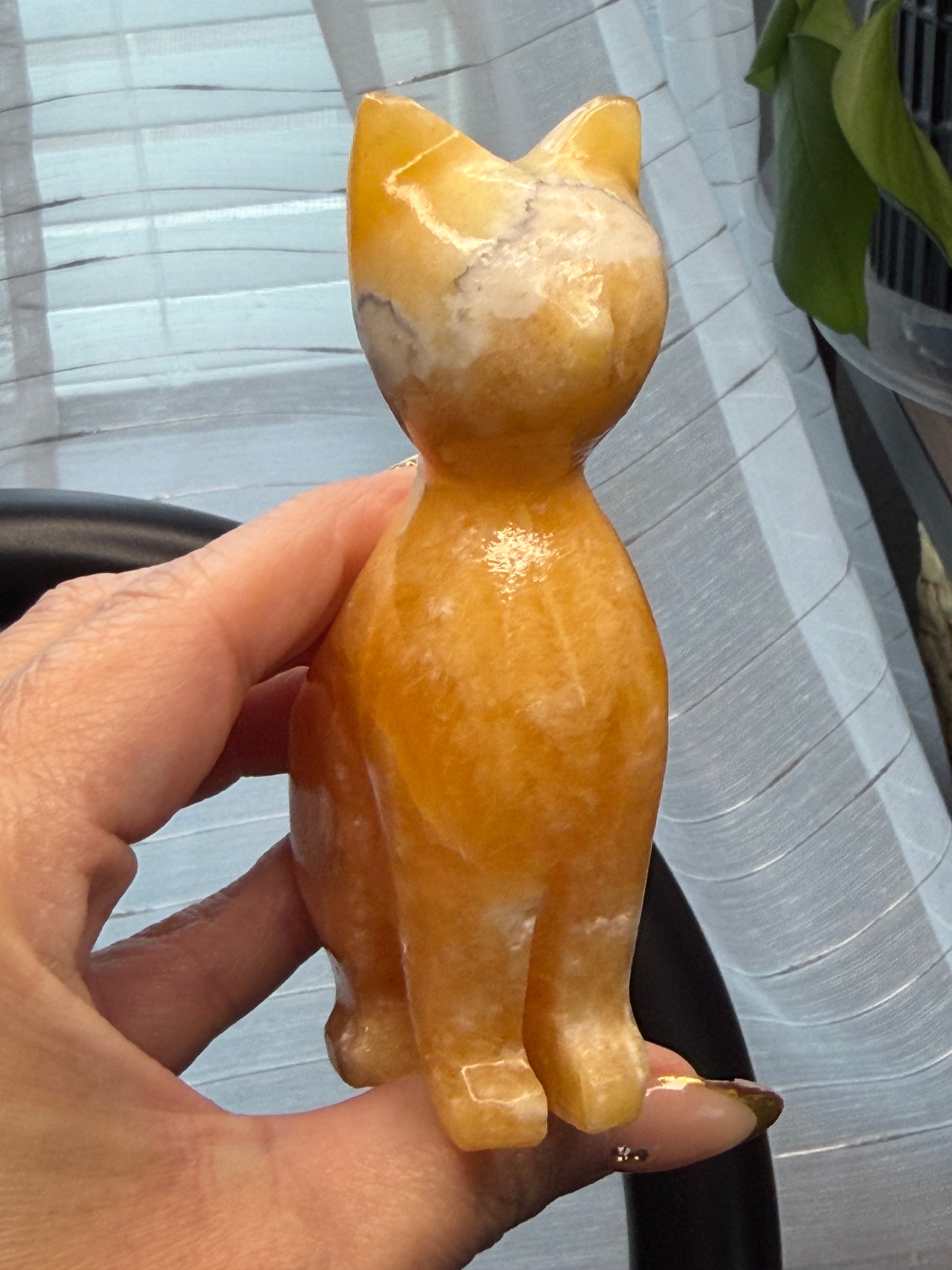 Orange Calcite Cat Carving - UV Reactive Fluorescent Stone Figurine