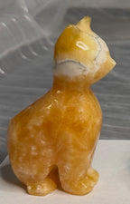 Orange Calcite Cat Carving - UV Reactive Fluorescent Stone Figurine
