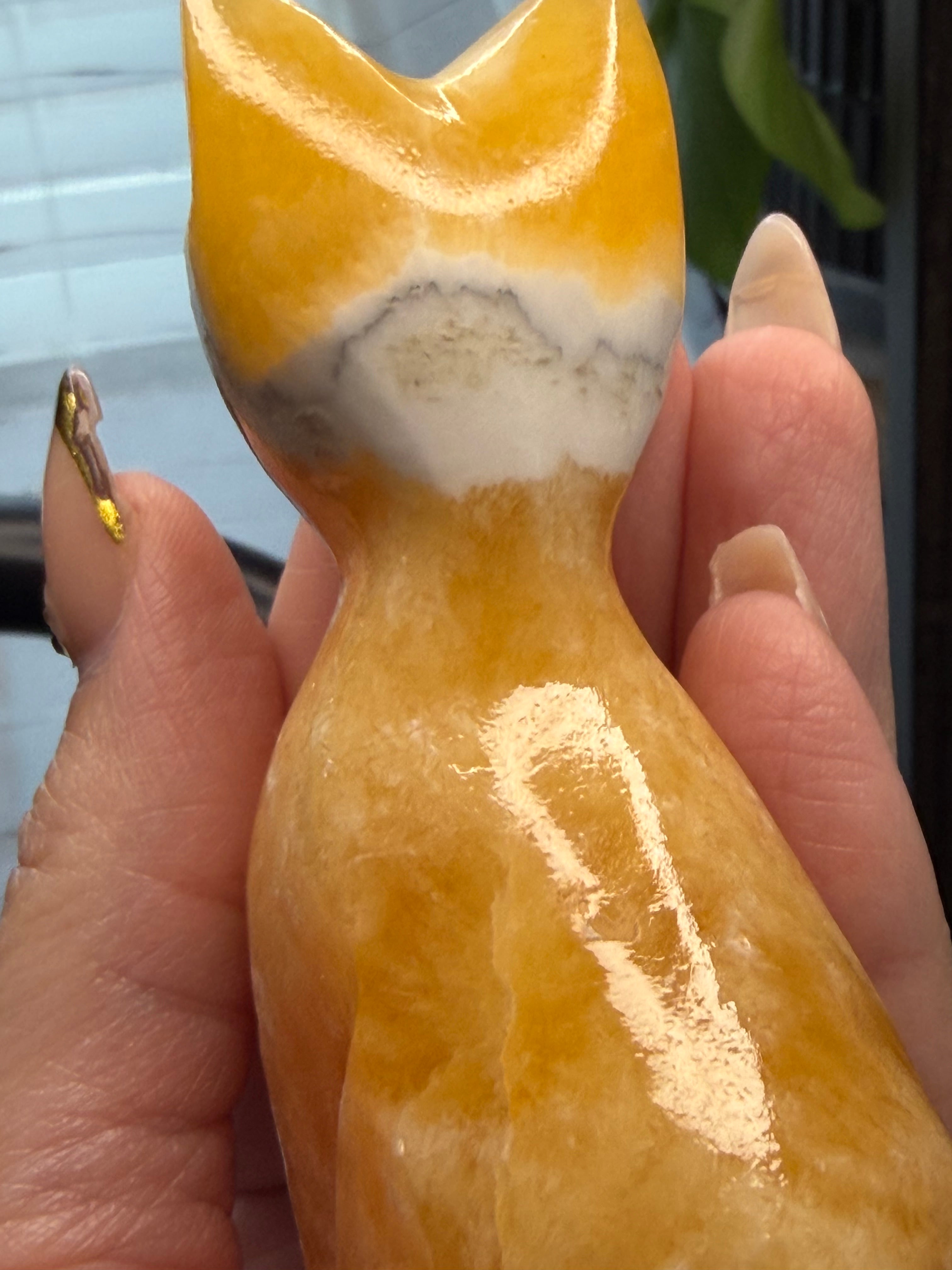 Orange Calcite Cat Carving - UV Reactive Fluorescent Stone Figurine