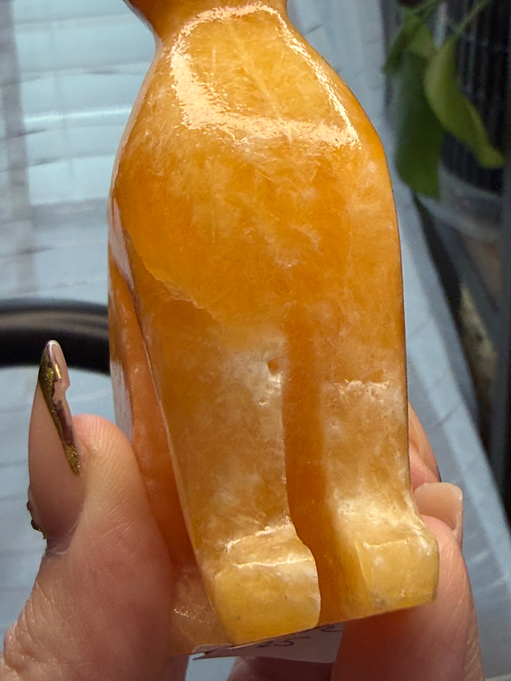 Orange Calcite Cat Carving - UV Reactive Fluorescent Stone Figurine