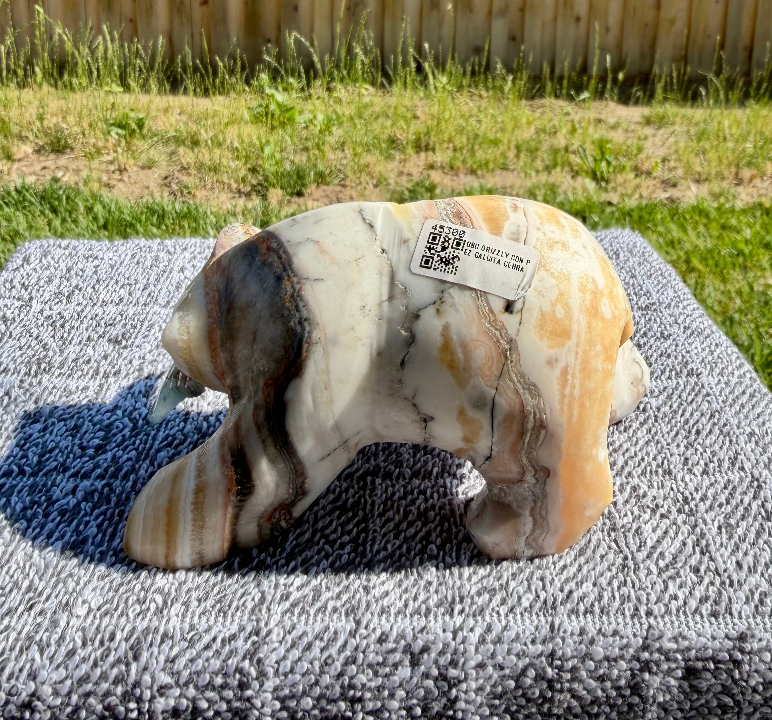 Zebra Calcite Grizzly Bear with Blue Onyx Fish - Banded Calcite Carving