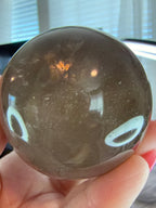 Smoky Quartz Crystal Sphere 61.8mm - Rainbow Inclusions - Natural Stone Home Decor