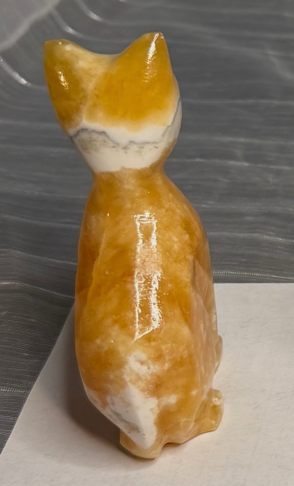 Orange Calcite Cat Carving - UV Reactive Fluorescent Stone Figurine