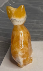 Orange Calcite Cat Carving - UV Reactive Fluorescent Stone Figurine