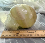 Mexican Green Onyx Skull Carving - UV Reactive Banded Calcite